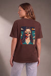 Woman wearing a custom brown relaxed tee with a colorful portrait print