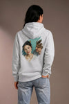 Woman wearing a custom gray hoodie with a colorful printed design