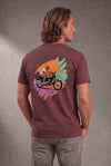 Man wearing a custom faded maroon tee with a colorful pet design