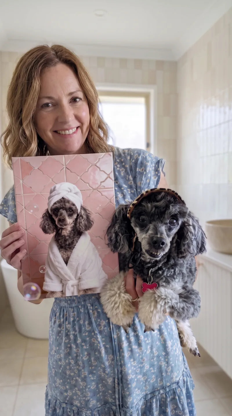 Jess holding her poodle and the playful spa style canvas portrait she designed of her