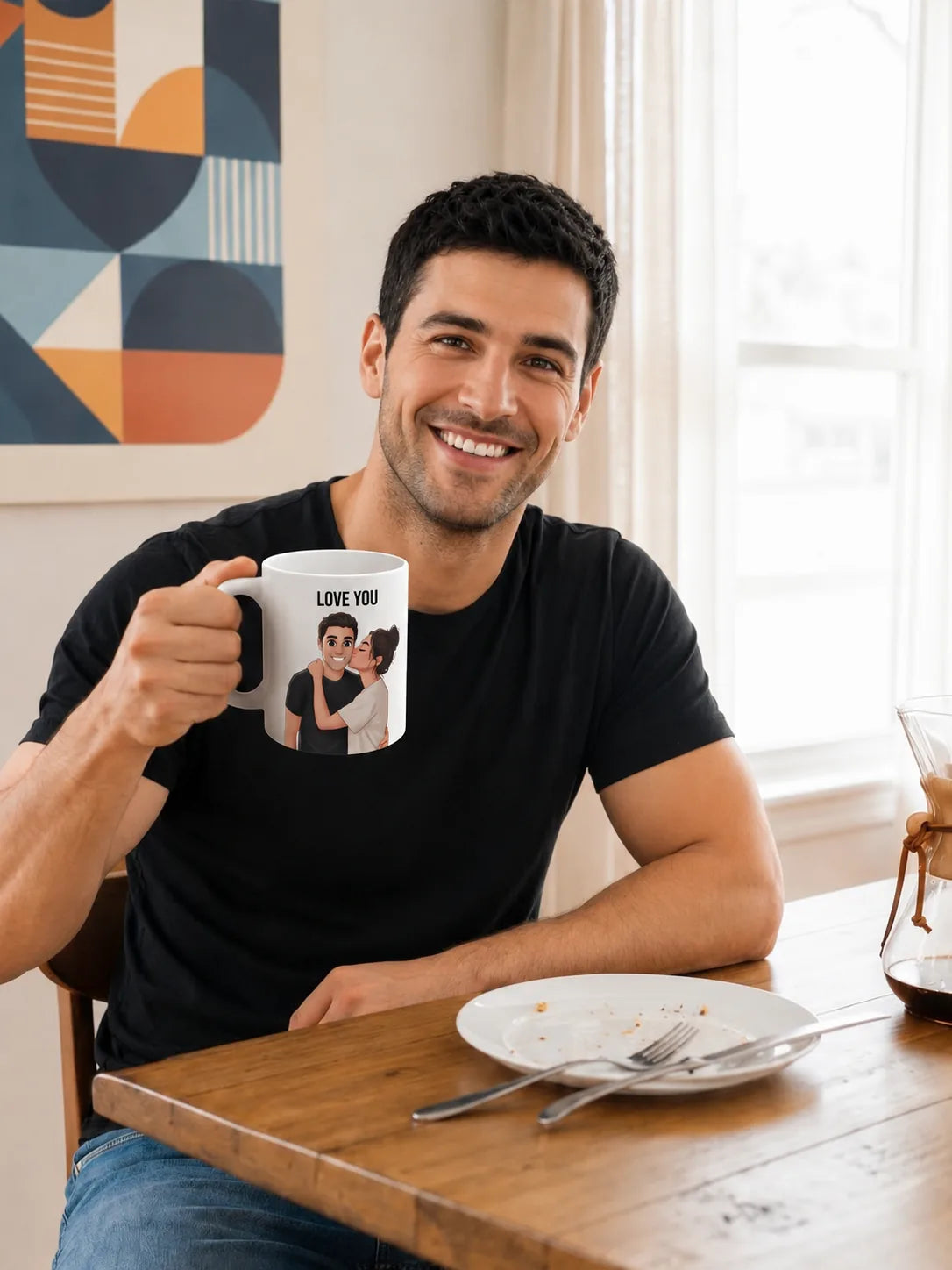 Smiling father holding a personalized LOVE YOU mug at the kitchen table